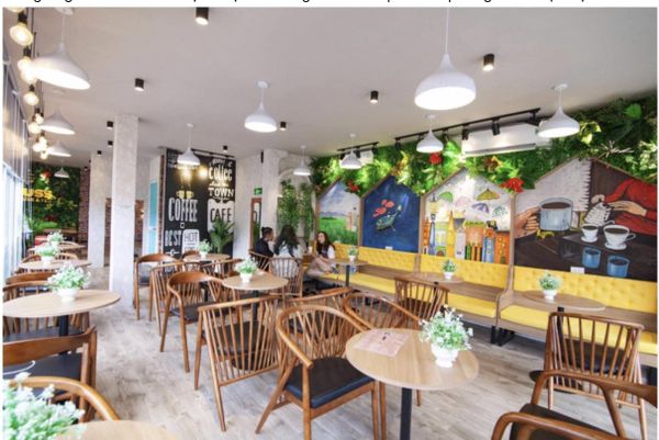 ban-ghe-go-cho-quan-tra-sua-4-tu-trung-hieu-an-moc_9c12ccd3ea7d4baf8f5fcead33b53f4d_grande Bộ bàn ghế trà sữa gỗ 9 nan thiết kế độc lạ là đặc trưng của quán