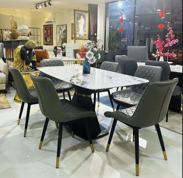 bo_ban_an_mat_da_ghe_da_1_d1b7fc2b9bb04802960817b95f40c3d9_grande Tân trang bộ bàn ghế ăn gia đình 2