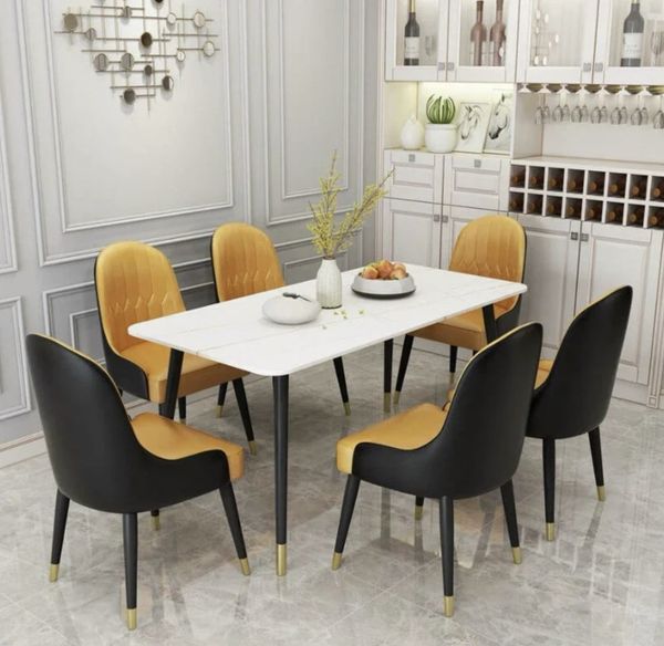 bo_ban_an_mat_da_ghe_da_3_f3fe4ff13fa94664a0133749f8807c19_grande Tân trang bộ bàn ghế ăn gia đình 1