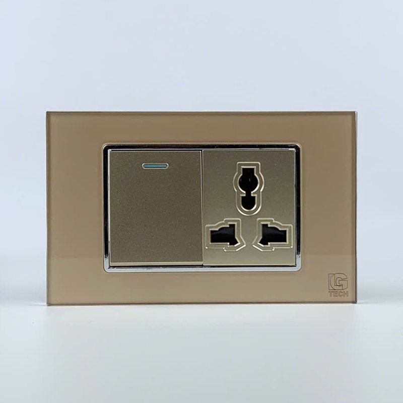 Mô đun công tắc đơn 2 chiều và ổ cắm 3 chấu, size 36mm viền kính màu gold LG Tech 1 Mô đun công tắc đơn 2 chiều và ổ cắm 3 chấu, size 36mm viền kính màu gold LG Tech
