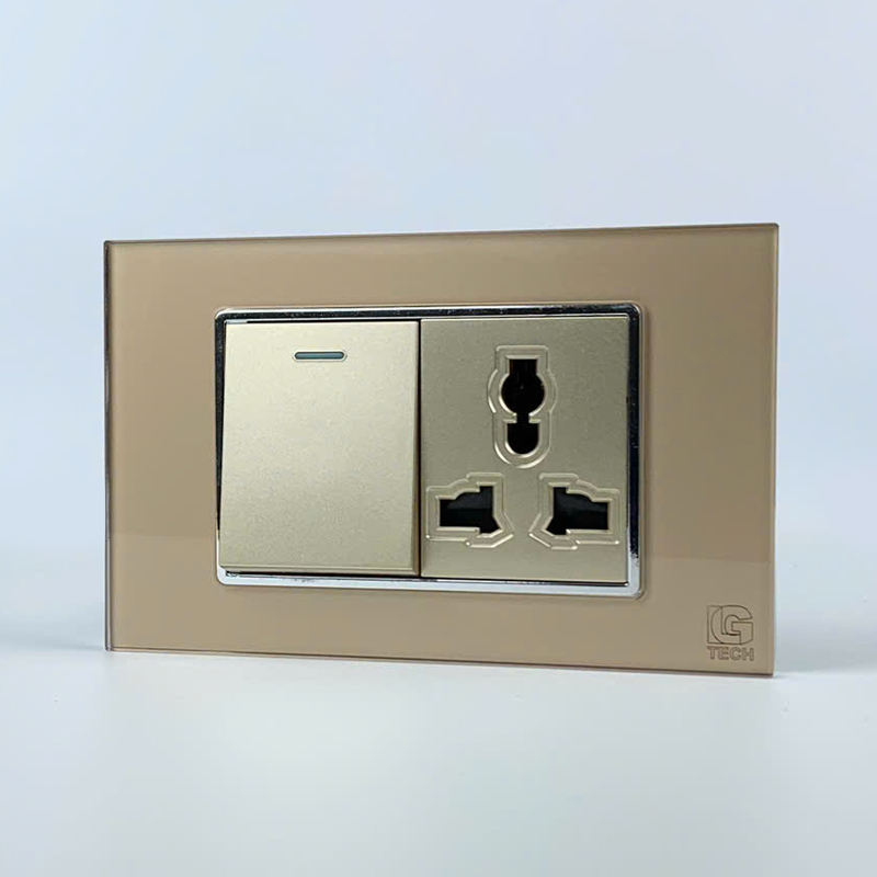 Mô đun công tắc đơn 2 chiều và ổ cắm 3 chấu, size 36mm viền kính màu gold LG Tech 2 Mô đun công tắc đơn 2 chiều và ổ cắm 3 chấu, size 36mm viền kính màu gold LG Tech