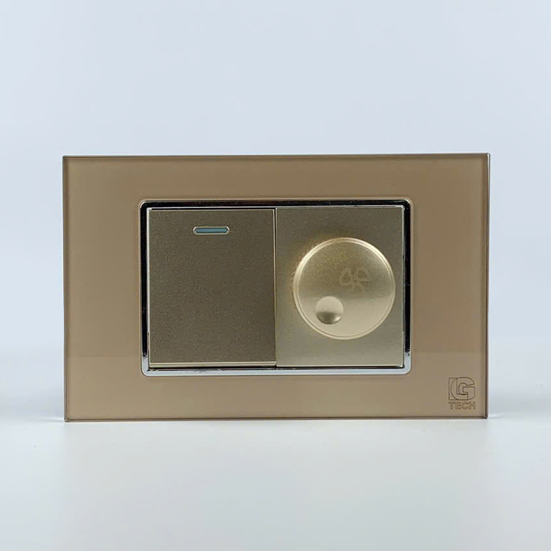 Mô đun công tắc đơn 1 chiều và công tắc quạt, size 36mm viền kính màu gold LG Tech 1 Mô đun công tắc đơn 1 chiều và công tắc quạt, size 36mm viền kính màu gold LG Tech
