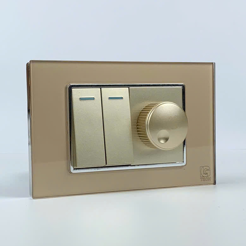 Mô đun công tắc đôi 2 chiều và công tắc quạt, viền kính size 36mm màu gold LG Tech 2 Mô đun công tắc đôi 2 chiều và công tắc quạt, viền kính size 36mm màu gold LG Tech