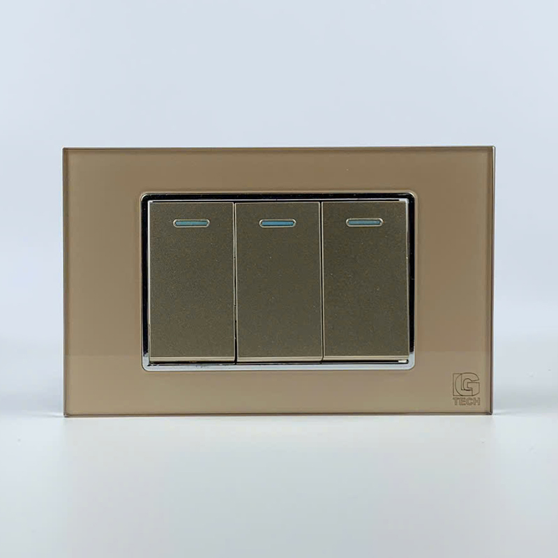 Mô đun 3 công tắc đơn một chiều, size 24mm viền kính màu gold LG Tech 1 Mô đun 3 công tắc đơn một chiều, size 24mm viền kính màu gold LG Tech