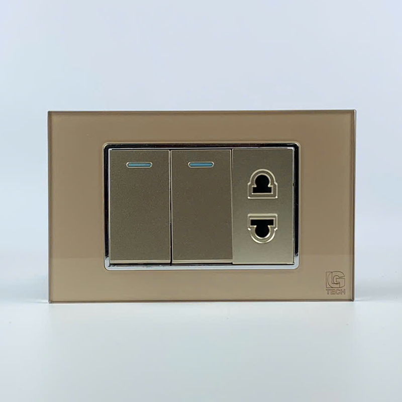 Mô đun 2 công tắc đơn 1 chiều và 1 ổ cắm 2 chấu, size 24mm viền kính màu gold LG Tech 1 Mô đun 2 công tắc đơn 1 chiều và 1 ổ cắm 2 chấu, size 24mm viền kính màu gold LG Tech