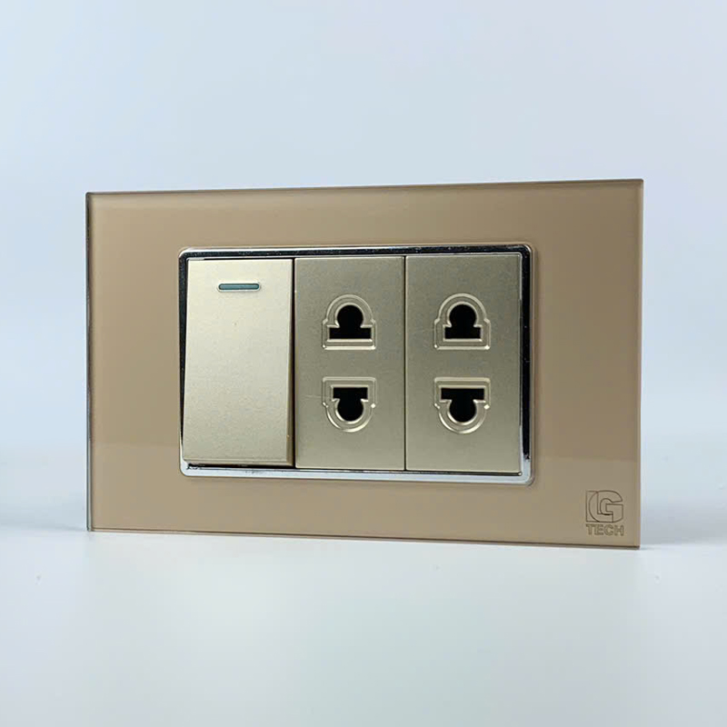 Mô đun công tắc đơn 1 chiều và 2 ổ cắm 2 chấu, size 24mm viền kính màu gold LG Tech 2 Mô đun công tắc đơn 1 chiều và 2 ổ cắm 2 chấu, size 24mm viền kính màu gold LG Tech