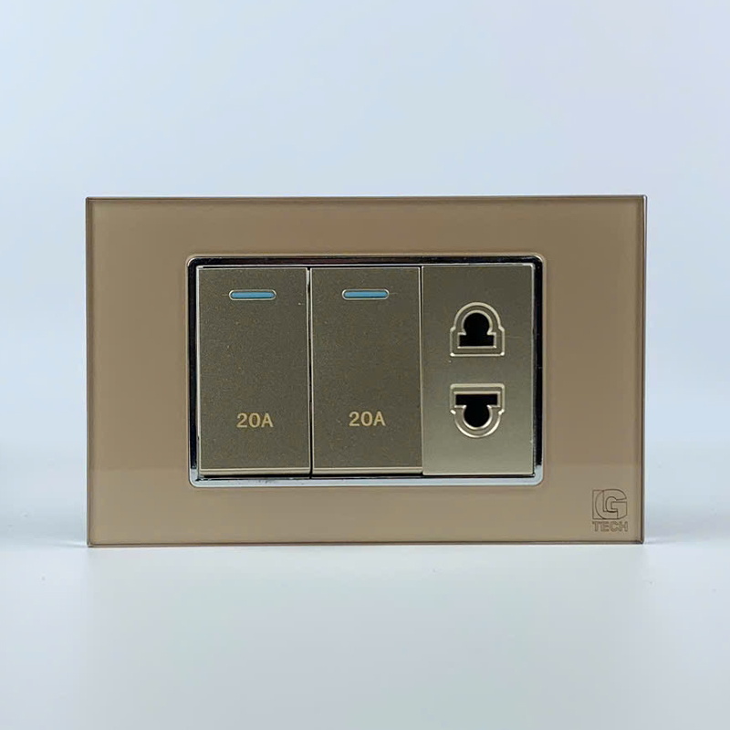 Mô đun 2 công tắc 20A và 1 ổ cắm 2 chấu, size 24mm viền kính màu gold LG Tech 1 Mô đun 2 công tắc 20A và 1 ổ cắm 2 chấu, size 24mm viền kính màu gold LG Tech