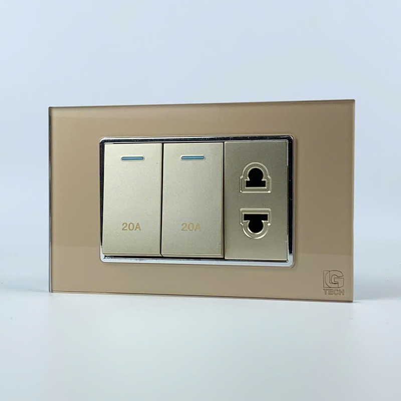 Mô đun 2 công tắc 20A và 1 ổ cắm 2 chấu, size 24mm viền kính màu gold LG Tech 2 Mô đun 2 công tắc 20A và 1 ổ cắm 2 chấu, size 24mm viền kính màu gold LG Tech