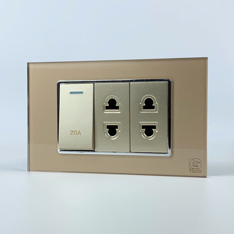Mô đun công tắc 20A và 2 ổ cắm 2 chấu, size 24mm viền kính màu gold LG Tech 2 Mô đun công tắc 20A và 2 ổ cắm 2 chấu, size 24mm viền kính màu gold LG Tech